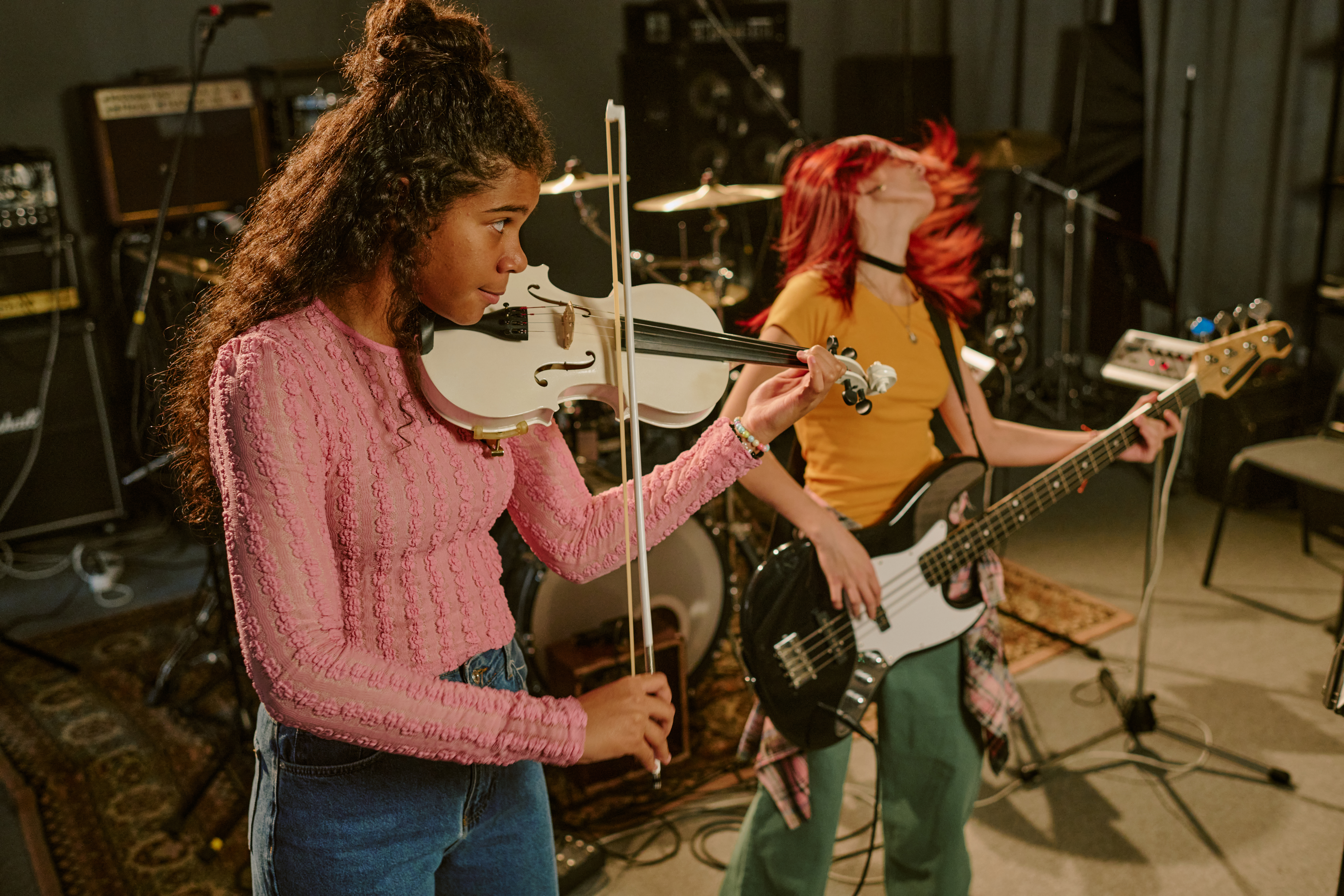 Violinist and Guitarist Having Fun Together